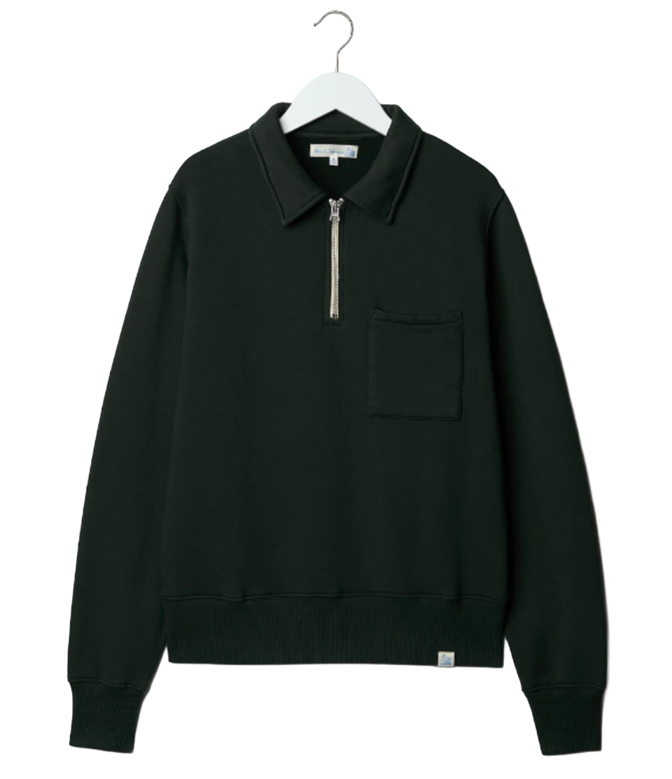 Green pullover with a collar on a white hanger against a white background