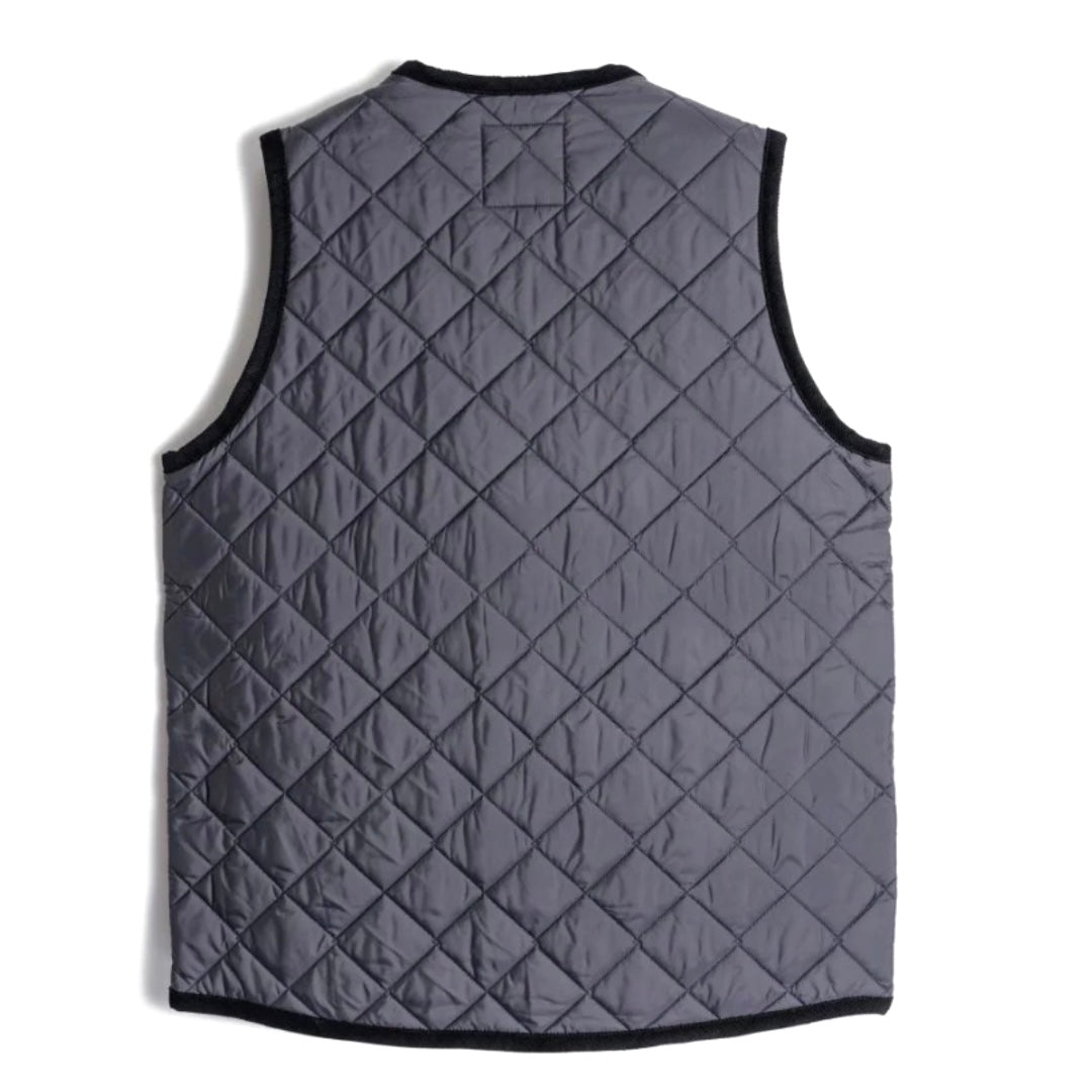Lavenham Thornham Gilet in navy, a stylish outdoor outerwear piece with a quilted design and front pockets.