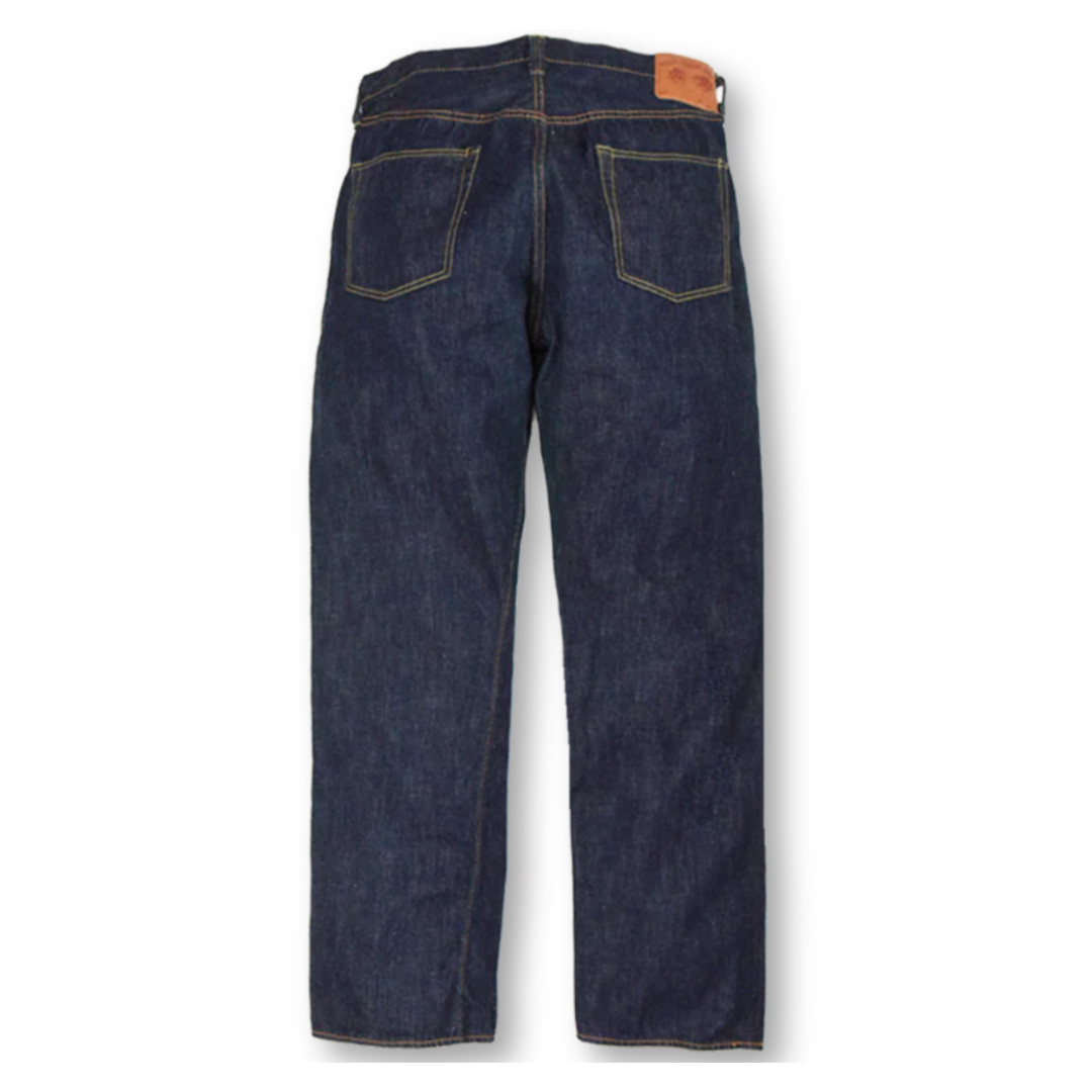 Back view of a pair of dark blue jeans on a white background