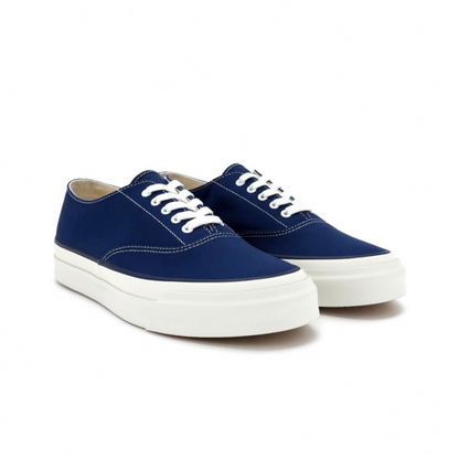 Asahi navy deck shoes showing classic slip-on style with white sole and leather upper, suitable for casual and nautical wear.