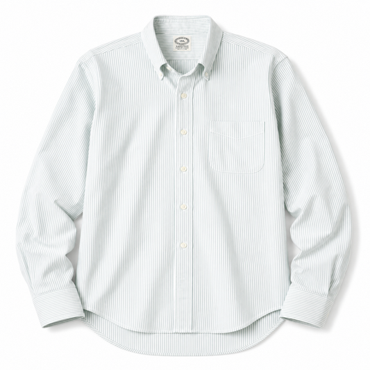 A long-sleeve button-down shirt with a fine vertical stripe pattern in white and a very light sage green, featuring a single chest pocket and a pointed collar.