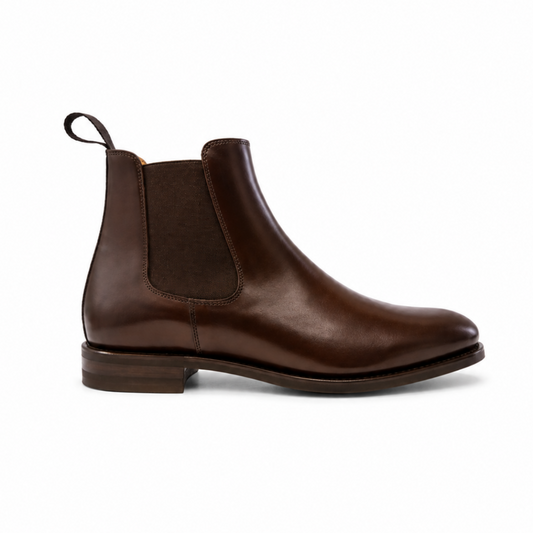 Black leather Chelsea boot on a white background