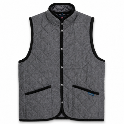 A gray quilted wool vest with black trim, featuring a stand-up collar, snap-button front, and two front patch pockets, shown against a plain white background.