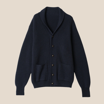 Dark blue cardigan with button details on a beige background