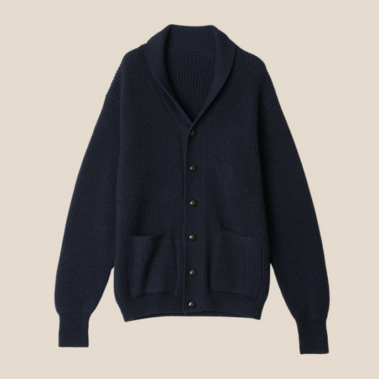 Dark blue cardigan with button details on a beige background