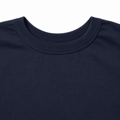 Close-up of a dark navy blue crewneck t-shirt showing the ribbed collar against a plain white background.