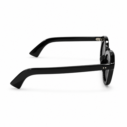 Black acetate round-frame sunglasses shown from a side profile view on a clean white background.