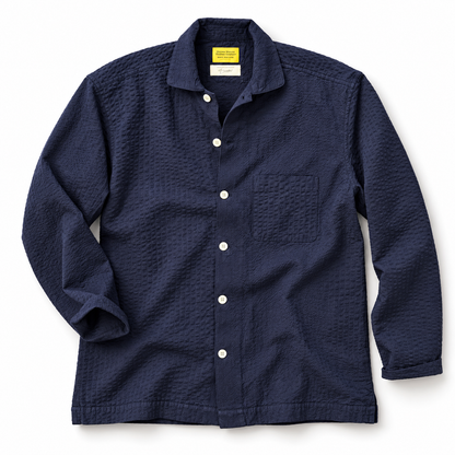 Navy seersucker over shirt by Original Madras Trading Co, lightweight casual shirt with a textured striped pattern.