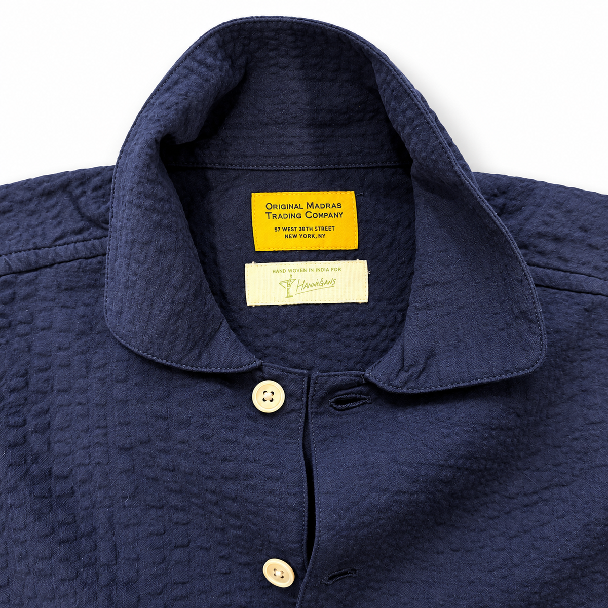 Original Madras Trading Co navy seersucker over shirt showing lightweight, textured cotton fabric and casual fit.