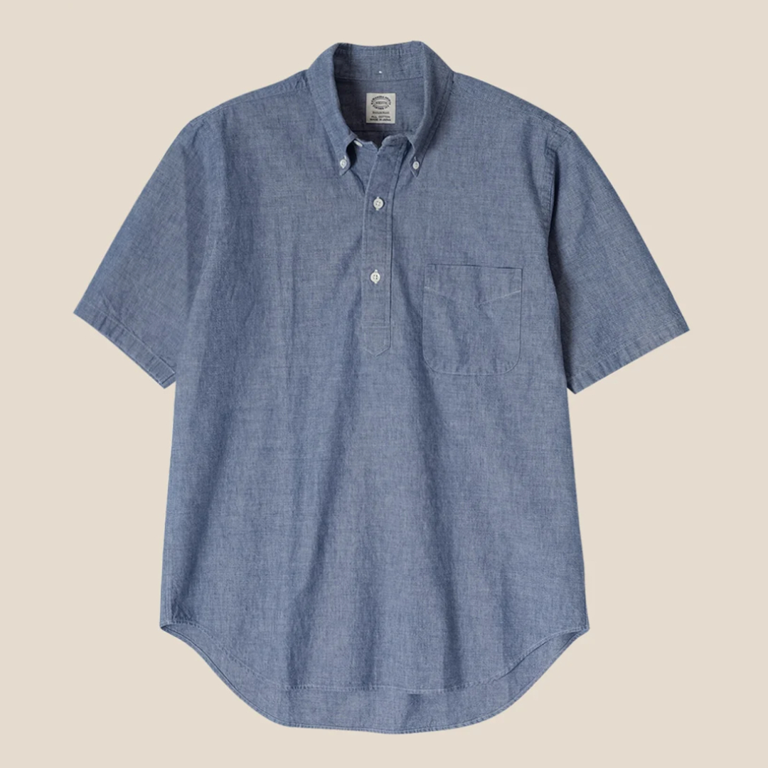 Blue short-sleeve shirt on a beige background