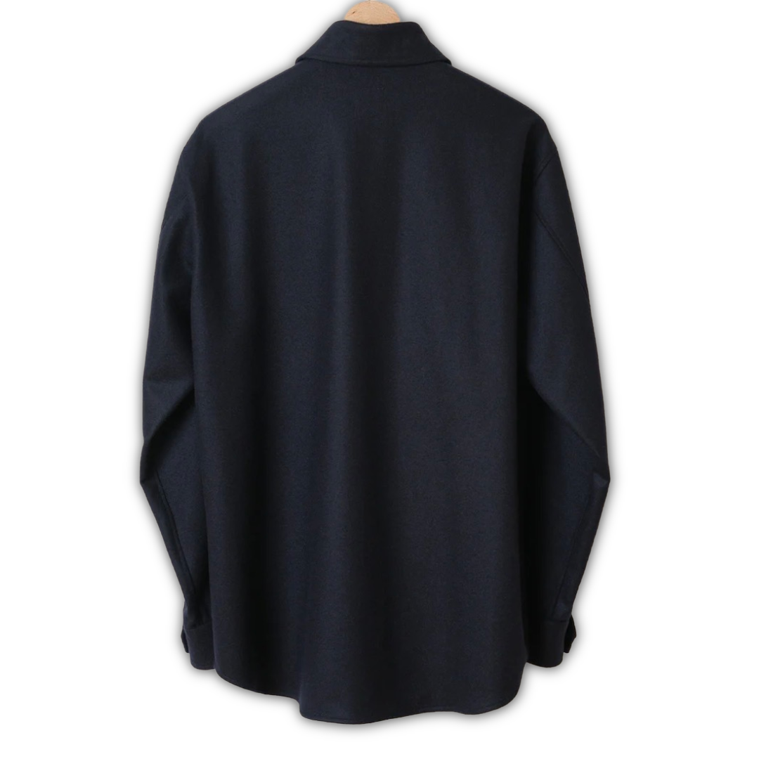 Kamakura Navy Wool Flannel CPO Over Shirt displayed on a hanger, showcasing its soft fabric and classic style.