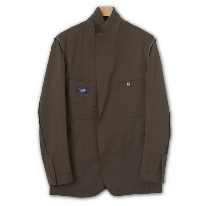 Kamakura brown seersucker jacket featuring a lightweight, textured fabric with a classic collar and button front.