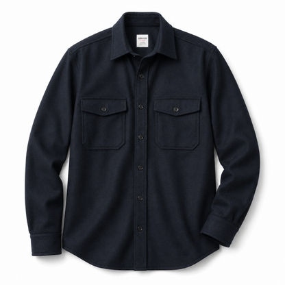 Kamakura navy wool flannel CPO over shirt displayed on a hanger, showcasing its classic design and button-up style.