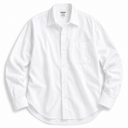 A white long-sleeve button-down dress shirt with a single chest pocket, laid flat against a white background.