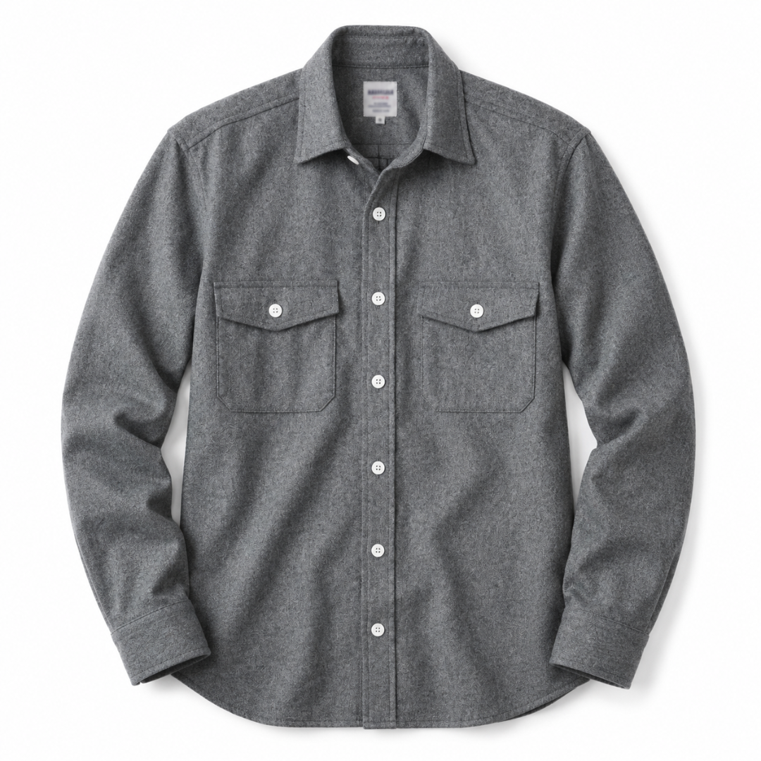 A dark gray heathered long-sleeve button-up shirt with two buttoned chest pockets, displayed flat against a white background.