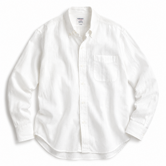 A white long-sleeve button-down shirt with a single chest pocket, laid flat against a white background.