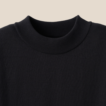 Black Mooncastle Ice Cotton mock neck short sleeve T-shirt displayed on a flat surface, showcasing its smooth fabric and minimalist design.