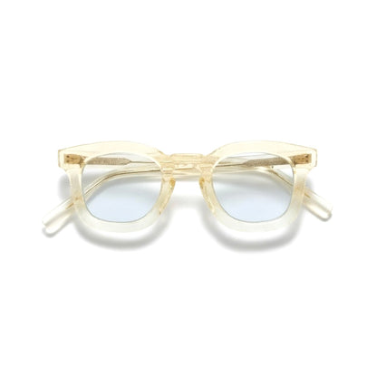 Guepard Guépard GP-17 champagne frame sunglasses with blue lenses, stylish accessory for sun protection and fashion.