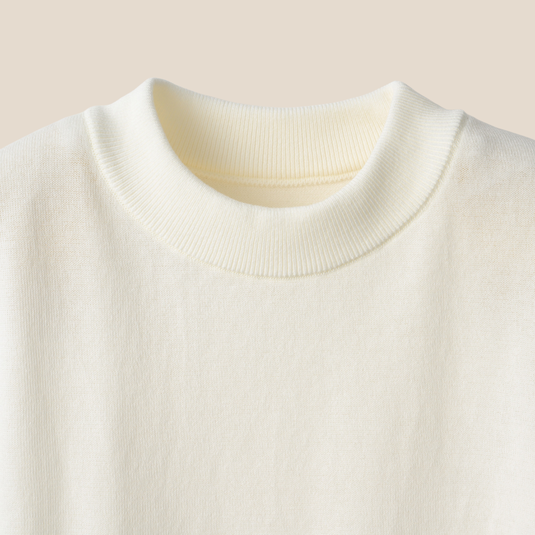 Mooncastle Ice Cotton Mock Neck T-shirt in off white with short sleeves, soft fabric and minimalist style.