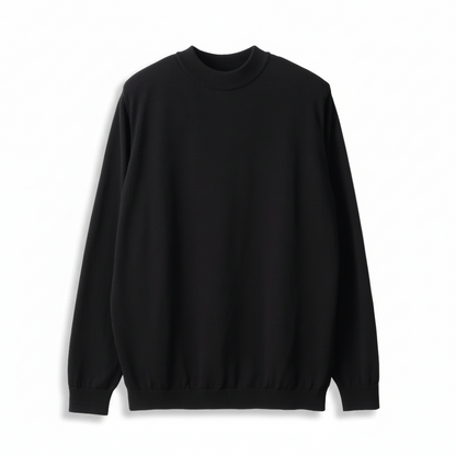 Black sweater on a beige background