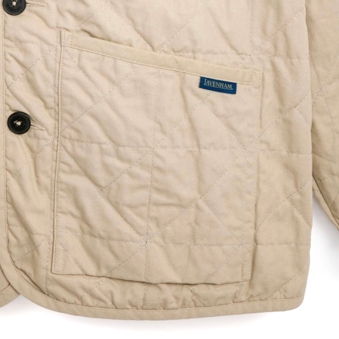 Lavenham unwadded Worker Jacket in stone color, showing front view with collar, button closure, and durable outerwear design.