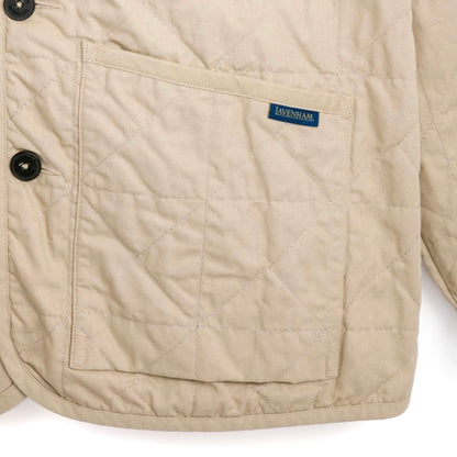 Lavenham unwadded Worker Jacket in stone color, showing front view with collar, button closure, and durable outerwear design.