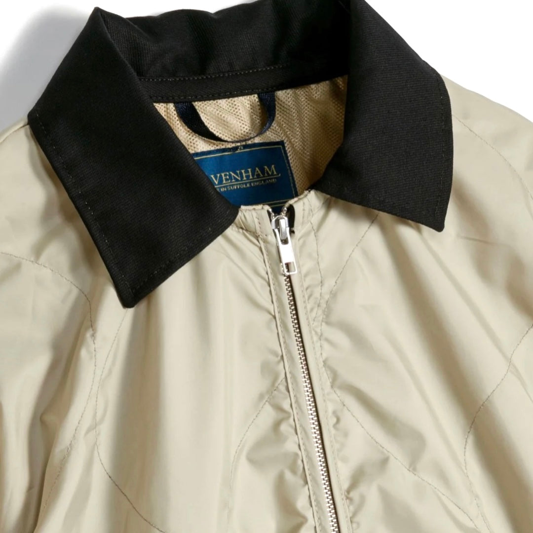 Lavenham windbreaker in natural clay color, lightweight outerwear with a smooth fabric finish and adjustable hood.