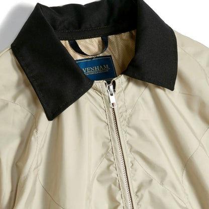 Lavenham windbreaker in natural clay color, lightweight outerwear with a smooth fabric finish and adjustable hood.