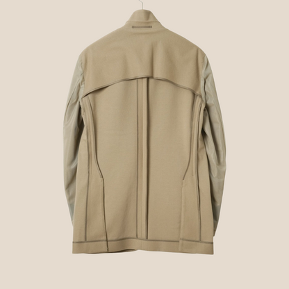 Beige Kamakura cotton stretch blazer jacket shown on a hanger, highlighting its tailored fit and smooth fabric texture.