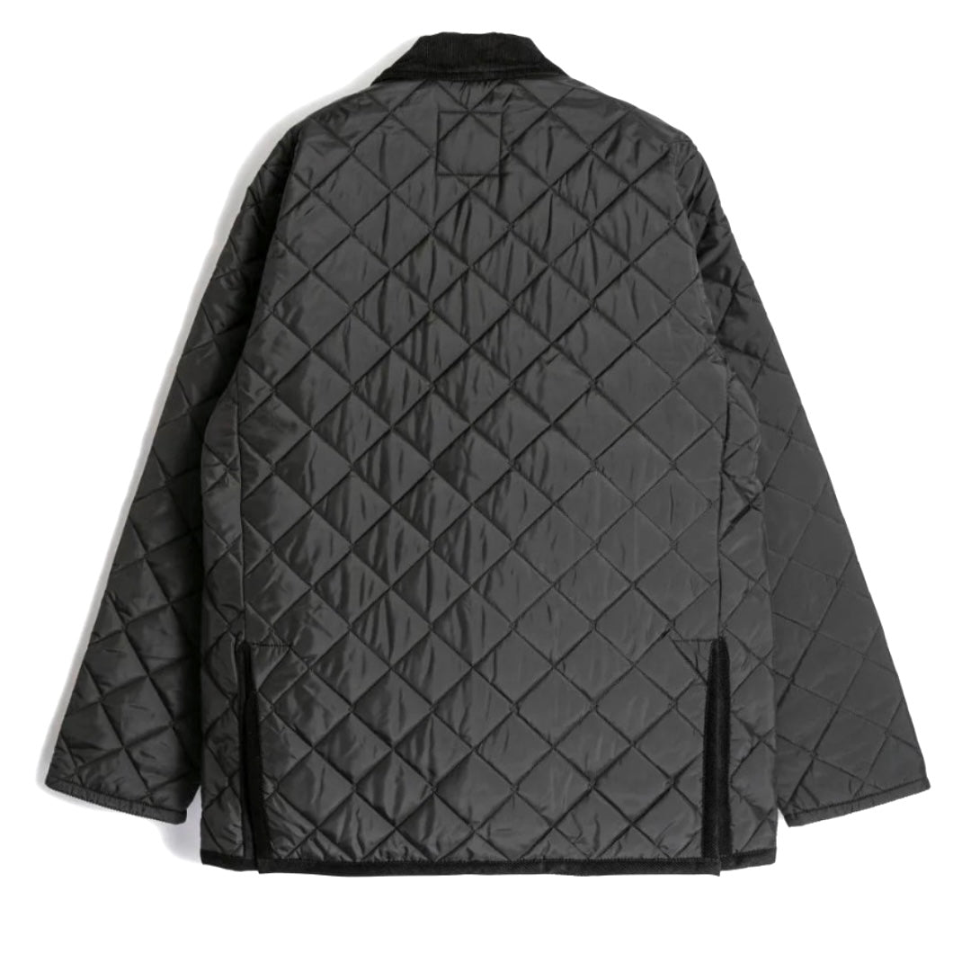 Black quilted jacket on a white background
