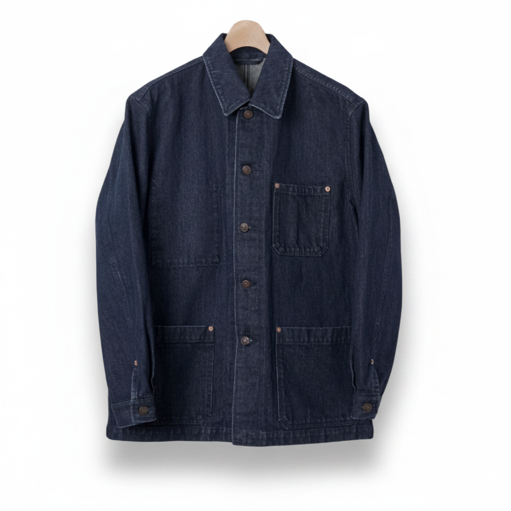 Blue denim jacket on a beige background