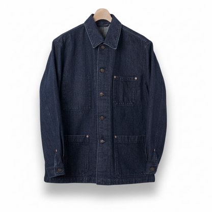 Blue denim jacket on a beige background