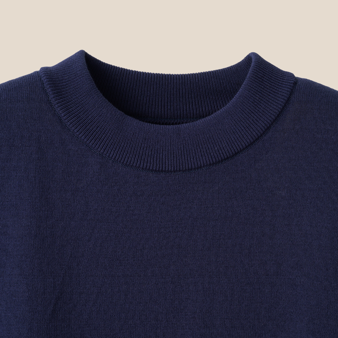 Mooncastle navy ice cotton mock neck short sleeve T-shirt displayed flat, showcasing its smooth fabric and clean design.