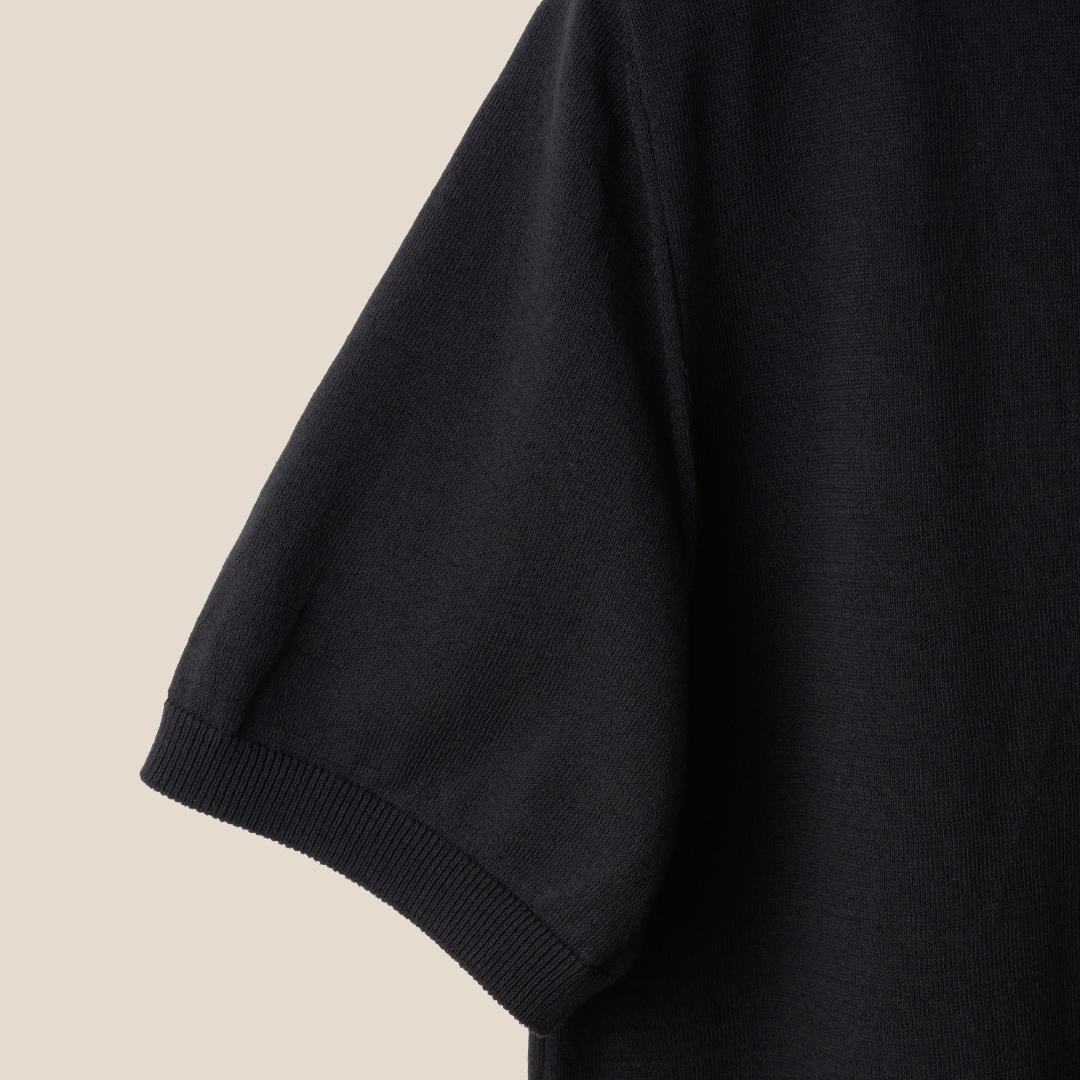Black Mooncastle Ice Cotton mock neck T-shirt with short sleeves, showcasing a sleek, fitted design.