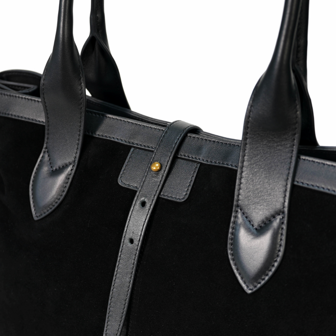 Black suede Adam’s Peach 050 tote bag with sleek design, showcasing its spacious interior and stylish accessory appeal.