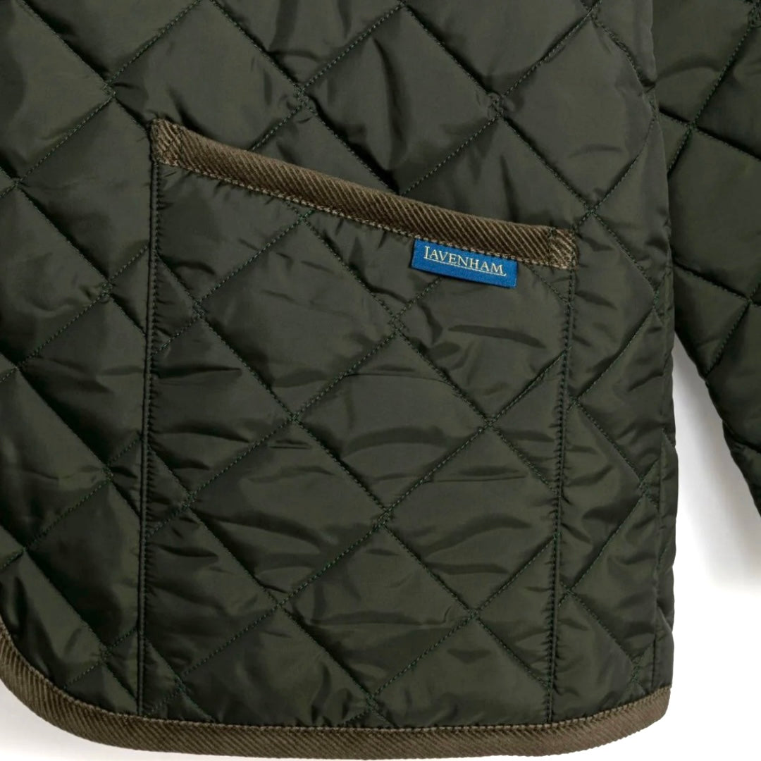 Quilted jacket with diamond pattern and visible brand label on a white background