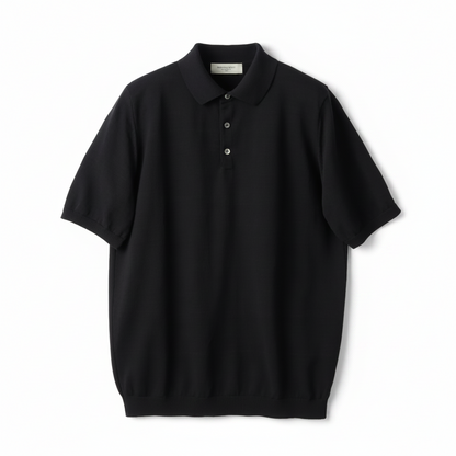 Black polo shirt on a beige background