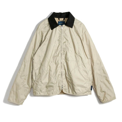 Beige jacket with black collar on a white background