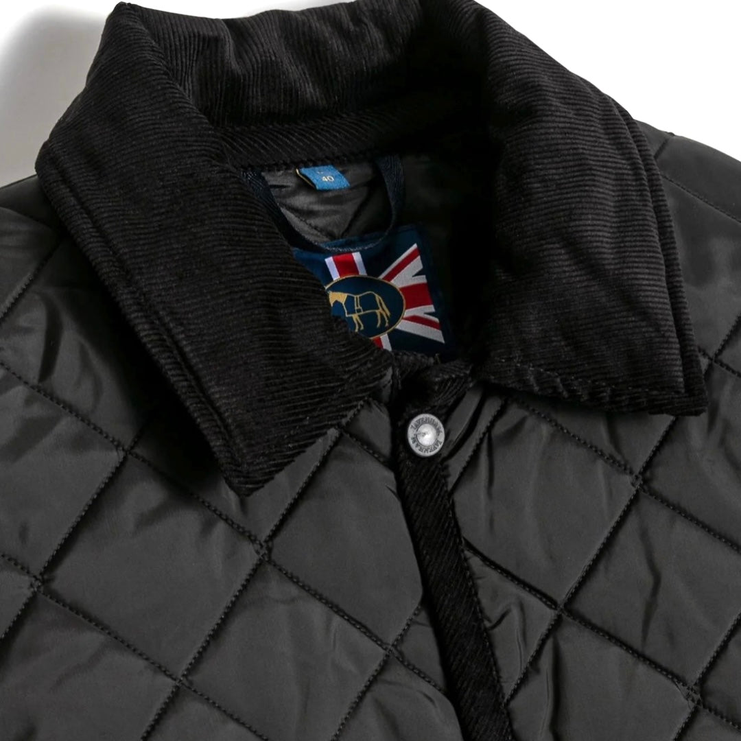 Black quilted jacket with a brand logo on the collar against a white background